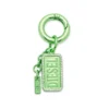 charm-diesel Metalowy brelok z logo Diesel i kryształkami